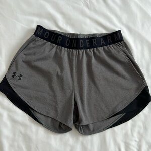 Under Armour women’s athletic shorts, size XS gray and black with pockets.